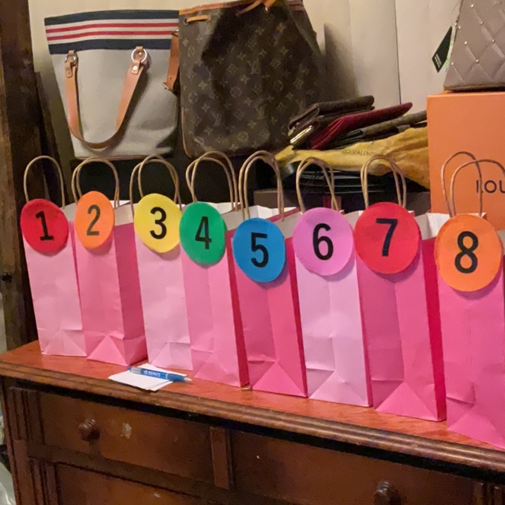 Mystery Gifts & a Guaranteed Win for a Designer Wallet!